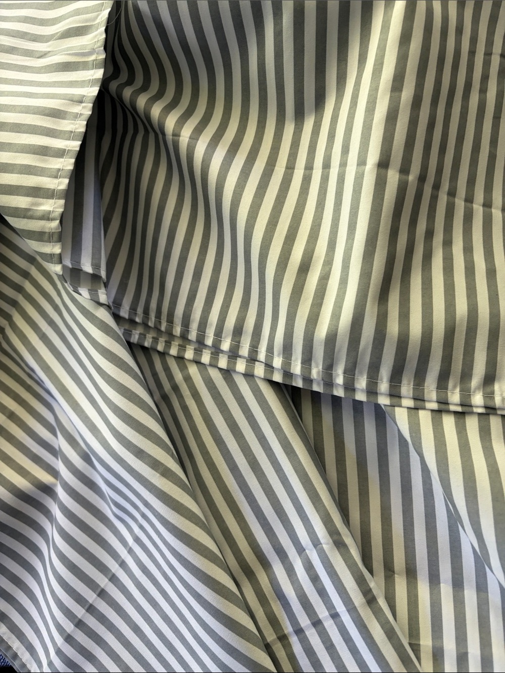 Grey and white striped tablecloth
